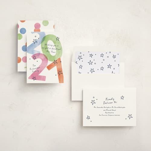 This is a frosting non photo holiday cards with standard by Pixel and Hank called new year stars printing on signature in standard