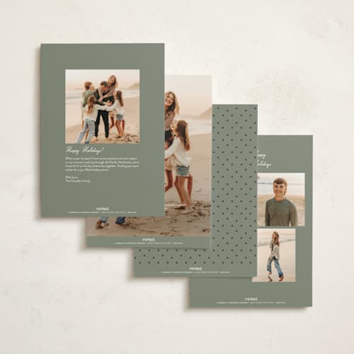 This is a pine non photo holiday cards with standard by Maja Cunningham called snowglobe printing on signature in standard