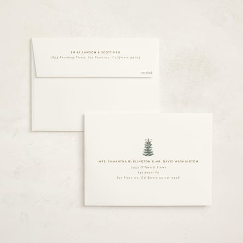 This is a champagne non photo holiday cards with standard by Angela Garrick called festive forest printing on signature in standard