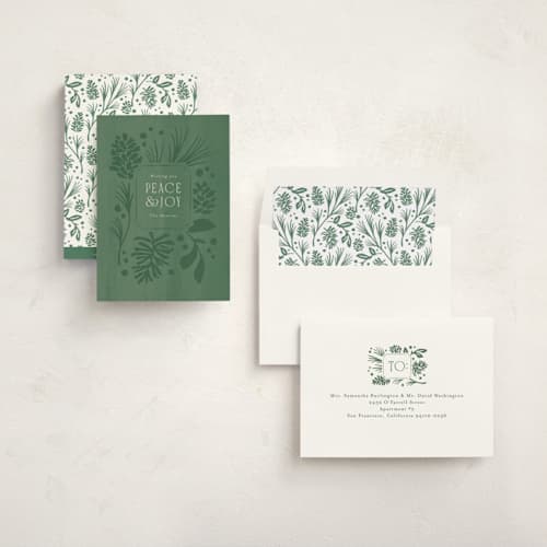 This is a wintergreen non photo holiday cards with standard by Jennifer Wick called pines and pinecones printing on signature in standard