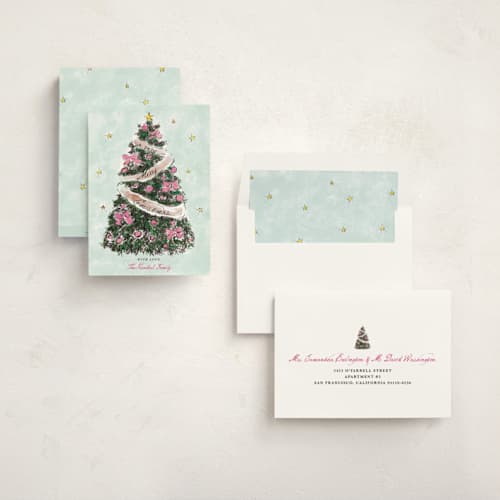 This is a winter rose non photo holiday cards with standard by Cass Loh called evergreen magic printing on signature in standard