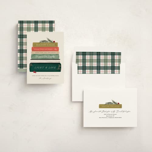 This is a holly jolly non photo holiday cards with standard by Kate Ahn called book stack printing on signature in standard