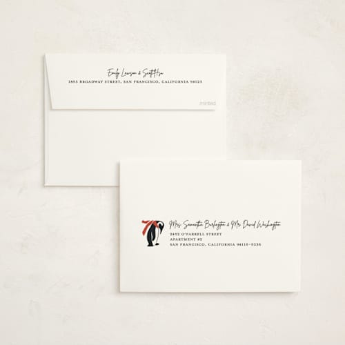 This is a candy cane non photo holiday cards with standard by Lauren Jinhee called march of the penguins printing on signature in standard