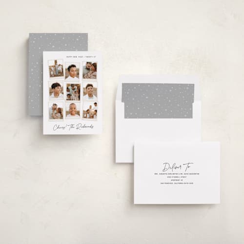 This is a snow new year photo cards with standard by Hooray Creative called nine snapshots printing on recycled smooth signature in standard