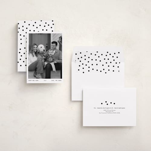 This is a snow new year photo cards with standard by Lindsay Megahed called momento printing on recycled smooth signature in standard