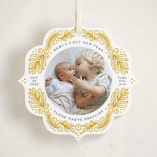 This is a ochre holiday card ornaments with standard by Genna Blackburn called first ornament printing on recycled smooth signature in ornament
