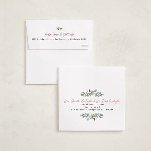 This is a snowfall holiday card ornaments with standard by Alethea and Ruth called pine wreath printing on recycled smooth signature in ornament
