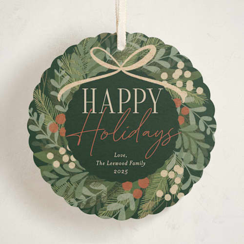 This is a pine needle holiday card ornaments with standard by Erin German called botanical wreath printing on signature in ornament