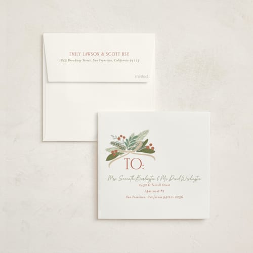 This is a pine needle holiday card ornaments with standard by Erin German called botanical wreath printing on signature in ornament