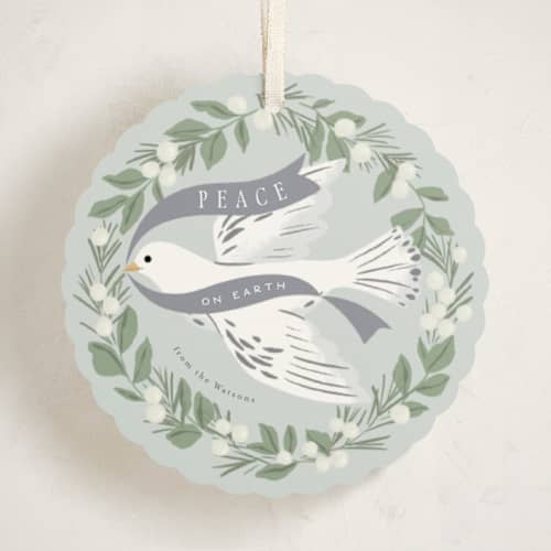 This is a ice holiday card ornaments with standard by Everett Paper Goods called dove wreath printing on signature in ornament