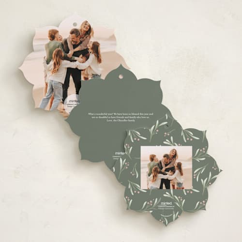 This is a wreath holiday card ornaments with standard by Randi Cirelli called merry & new printing on recycled smooth signature in ornament