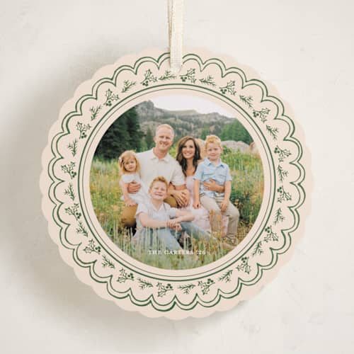 This is a fir holiday card ornaments with standard by Teju Reval called scalloped holly printing on recycled smooth signature in ornament