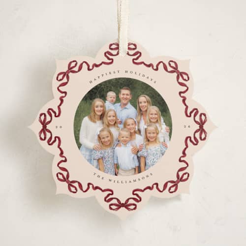 This is a cranberry holiday card ornaments with standard by Jenna Holcomb called bow ornament printing on recycled smooth signature in ornament
