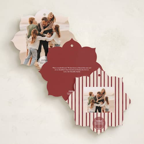 This is a cranberry holiday card ornaments with standard by Jenna Holcomb called bow ornament printing on recycled smooth signature in ornament