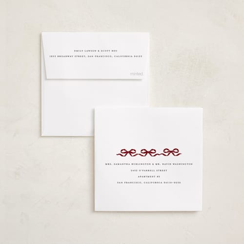 This is a cranberry holiday card ornaments with standard by Jenna Holcomb called bow ornament printing on recycled smooth signature in ornament
