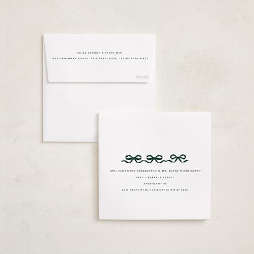 This is a pine needle holiday card ornaments with standard by Jenna Holcomb called bow ornament printing on recycled smooth signature in ornament