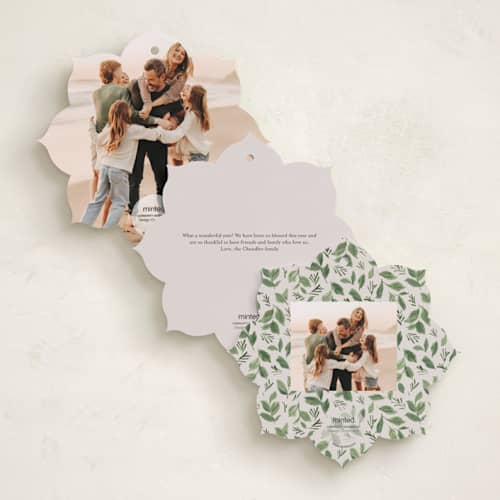This is a sleigh holiday card ornaments with standard by Everett Paper Goods called wreath of doves printing on recycled smooth signature in ornament