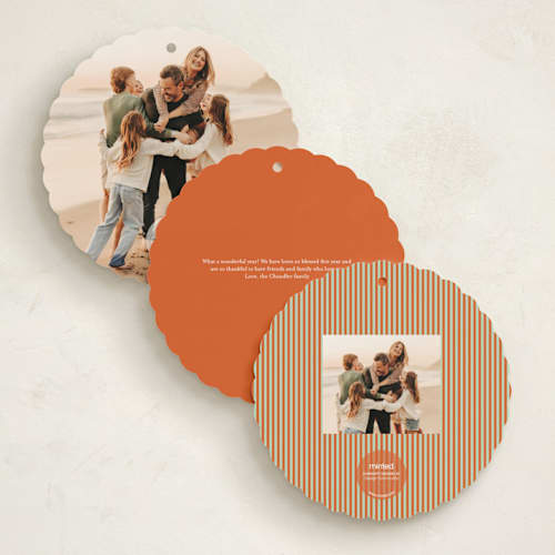 This is a tangerine holiday card ornaments with standard by Erika Firm called joy cloud printing on signature in ornament