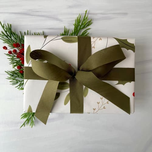 This is a green holiday decorations by Honey Silks Co called olive 3/4" x 15 ft holiday ribbon in standard
