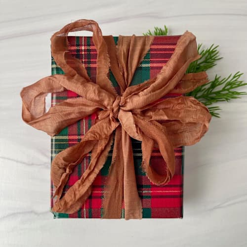 This is a brown holiday decorations by Honey Silks Co called chestnut chiffon silk ribbon - 10 yards in standard