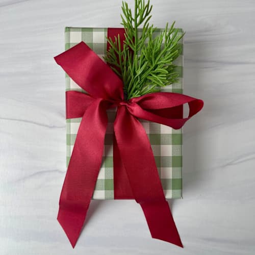 This is a red holiday decorations by Honey Silks Co called 1” dark red holiday ribbon - 5 yards in standard
