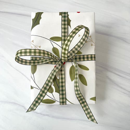 This is a green holiday decorations by Honey Silks Co called olive and cream gingham holiday ribbon 1/2" x 15 feet in standard