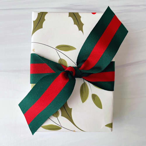 This is a red holiday decorations by Honey Silks Co called hampton holiday ribbon 1.5" x 15 feet in standard