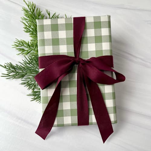 This is a purple holiday decorations by Honey Silks Co called sugar plum 3/4" x 15 ft holiday ribbon in standard