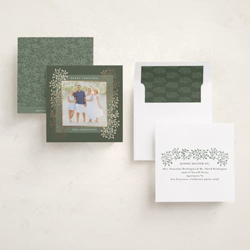 This is a sage foil pressed holiday cards with foil pressed by Tamara Hilje called laurel printing on recycled smooth signature in square