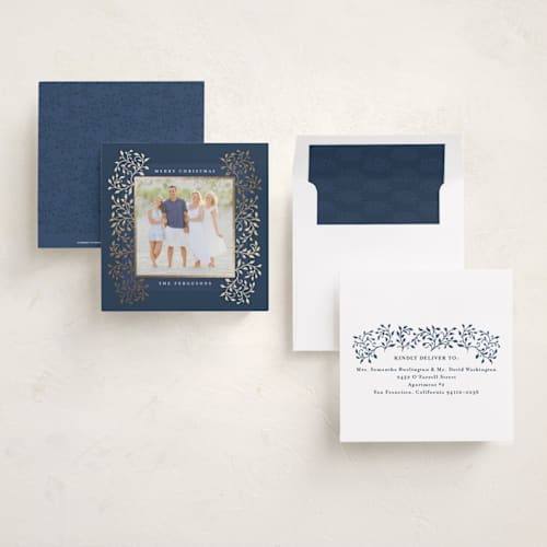 This is a navy foil pressed holiday cards with foil pressed by Tamara Hilje called laurel printing on recycled smooth signature in square