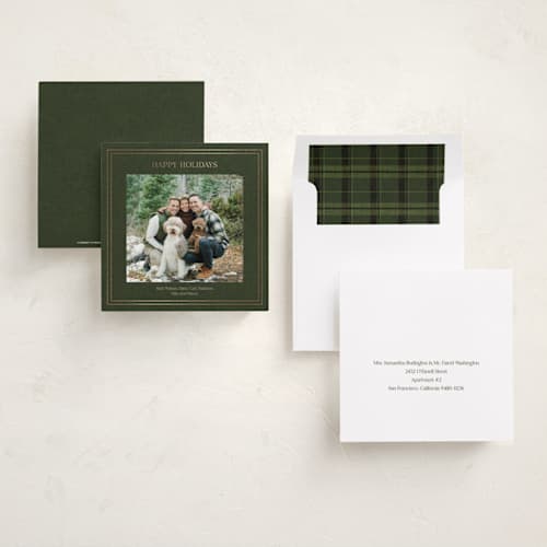This is a pine foil pressed holiday cards with foil pressed by Tina Faselli called traditional linen printing on recycled smooth signature in square