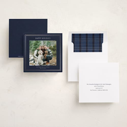 This is a navy foil pressed holiday cards with foil pressed by Tina Faselli called traditional linen printing on recycled smooth signature in square