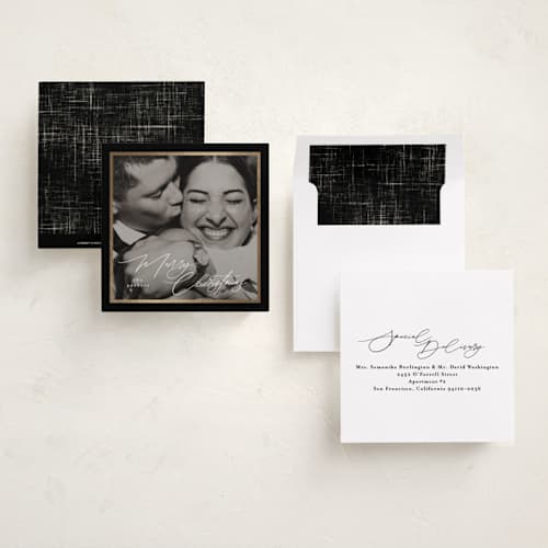 This is a licorice foil pressed holiday cards with foil pressed by Tamara Hilje called holiday soneto printing on recycled smooth signature in square