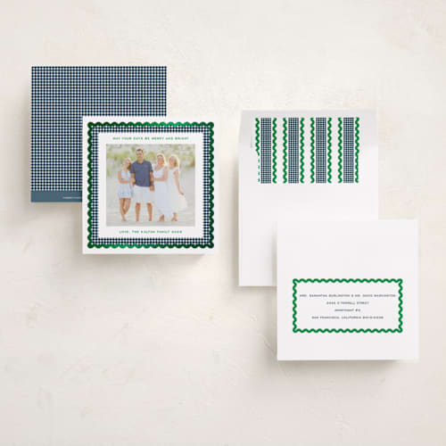 This is a navy foil pressed holiday cards with foil pressed by Erin German called gingham fun printing on recycled smooth signature in square