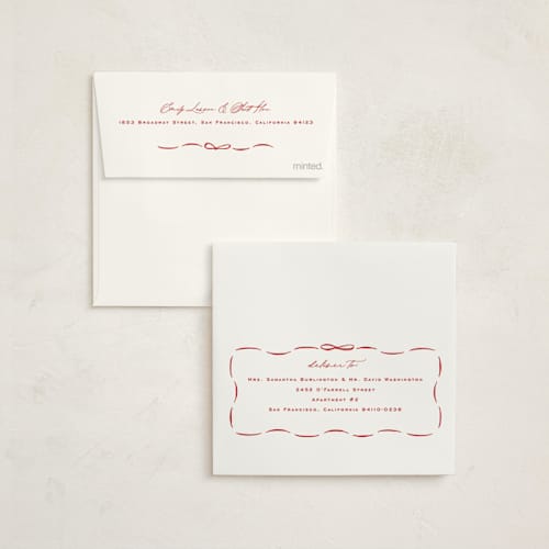 This is a poinsettia foil pressed holiday cards with foil pressed by Amy Kross called wrapped wreath printing on signature in square