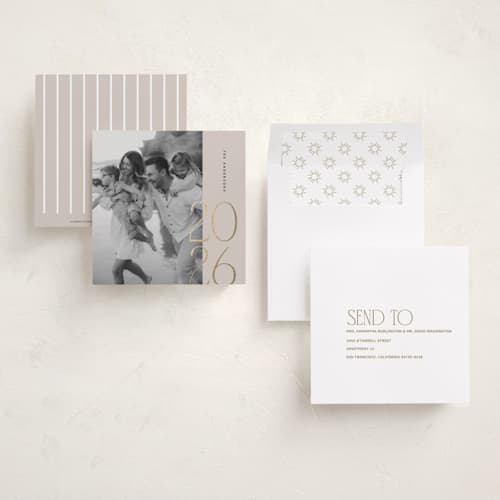 This is a fog foil pressed holiday cards with foil pressed by Ana Sharpe called year in display printing on recycled smooth signature in square