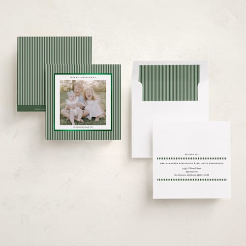 This is a pine needle foil pressed holiday cards with foil pressed by Lucrecia Caporale called striped frame printing on recycled smooth signature in square