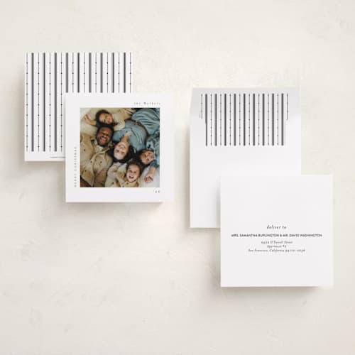 This is a charcoal foil pressed holiday cards with foil pressed by Lucrecia Caporale called merry & minimal style printing on recycled smooth signature in square