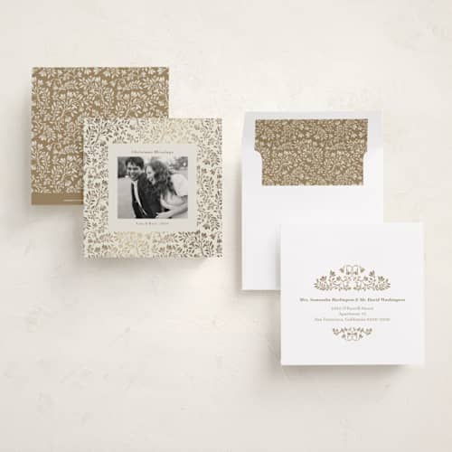 This is a vanilla foil pressed holiday cards with foil pressed by Anna Black called leafy pattern printing on recycled smooth signature in square