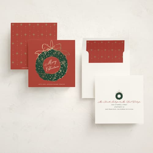 This is a berries foil pressed holiday cards with foil pressed by Cass Loh called gilded holiday wreath printing on signature in square