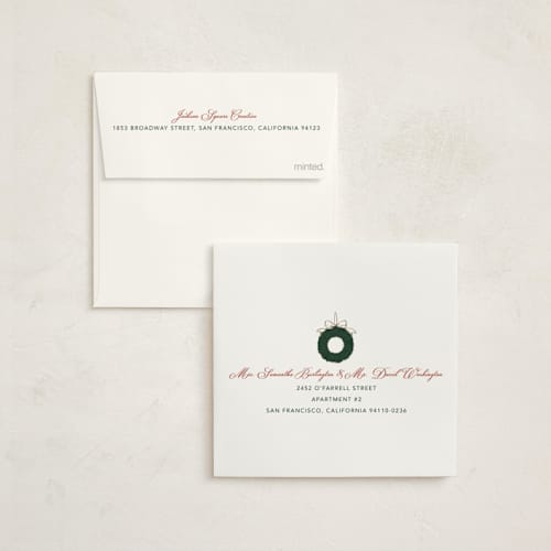 This is a berries foil pressed holiday cards with foil pressed by Cass Loh called gilded holiday wreath printing on signature in square