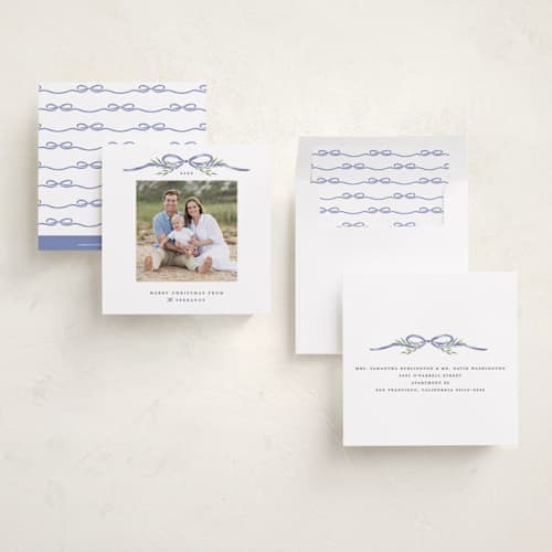 This is a french blue holiday photo cards with standard by Susan Zinader called bow topper printing on recycled smooth signature in square