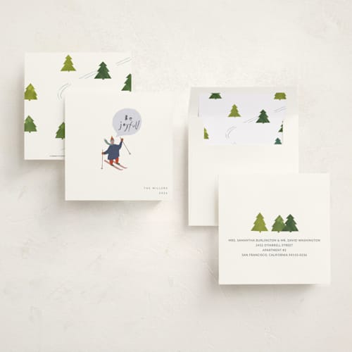 This is a snow holiday photo cards with standard by Sumak Studio called skier printing on signature in square