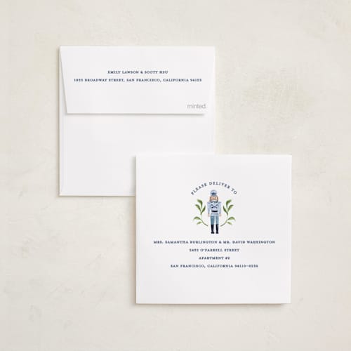 This is a blue ribbon holiday photo cards with standard by Sarah Knight called nutcracker ribbons printing on recycled smooth signature in square