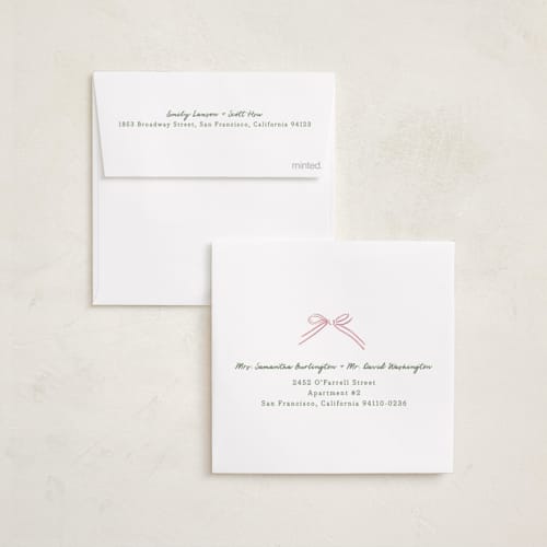 This is a pink sand holiday photo cards with standard by Chris Griffith called holiday wrap printing on recycled smooth signature in square