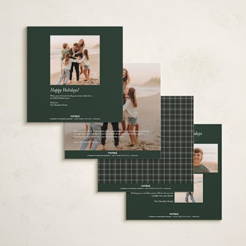 This is a wreath holiday photo cards with standard by Lottie Aldarwish called the tartan one printing on recycled smooth signature in square
