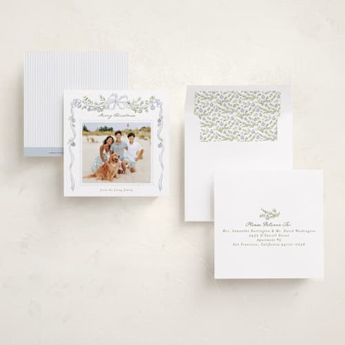 This is a icy blue holiday photo cards with standard by Everett Paper Goods called drape ribbon printing on recycled smooth signature in square