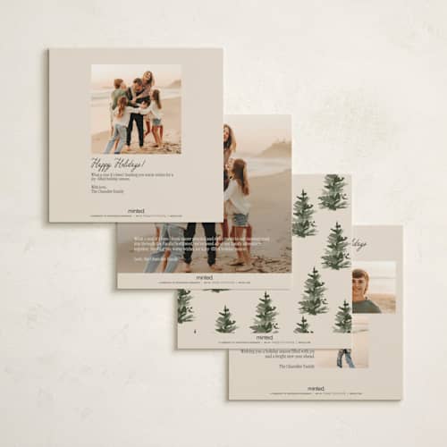 This is a cranberry holiday photo cards with standard by Angela Garrick called christmas forest printing on signature in square