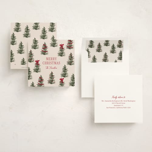 This is a cranberry holiday photo cards with standard by Angela Garrick called christmas forest printing on signature in square