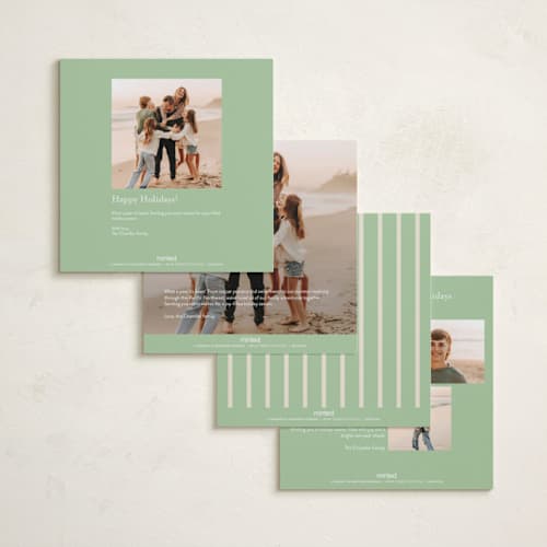 This is a mint holiday photo cards with standard by Ellen Schlegelmilch called two type printing on signature in square